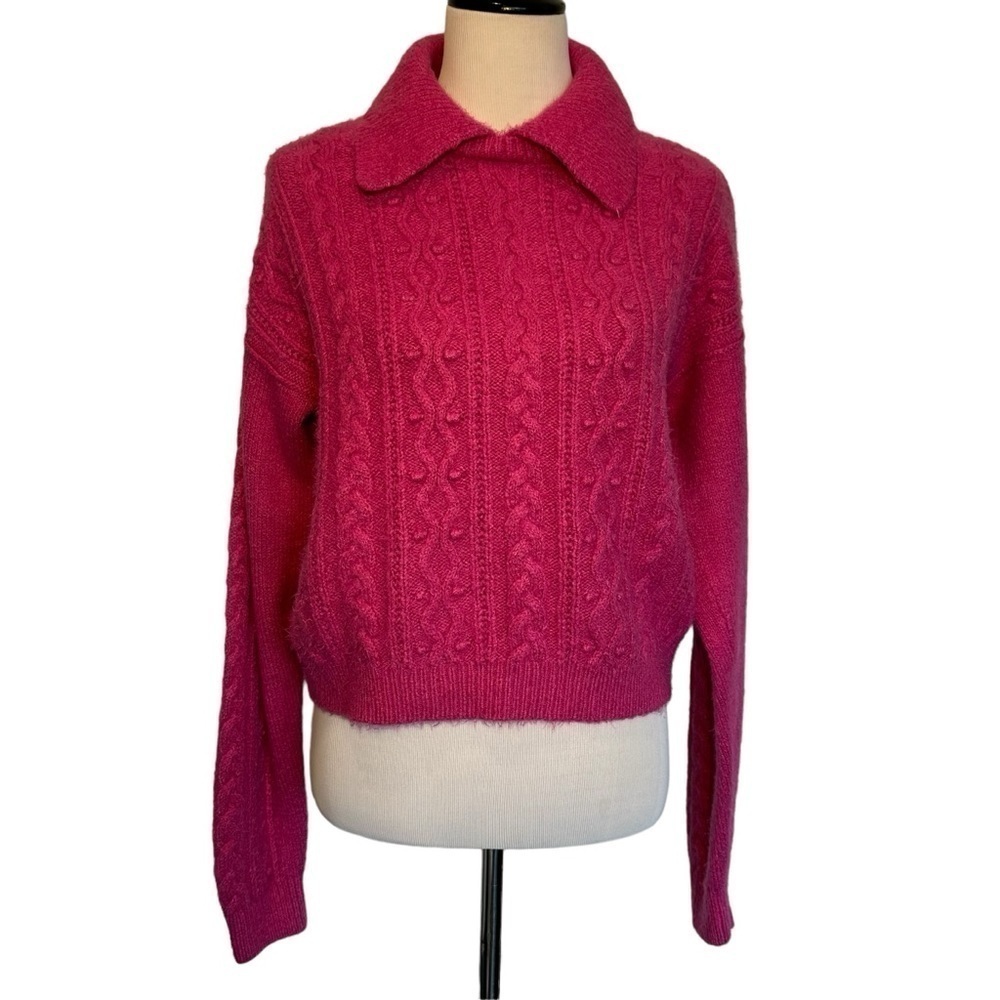 Pink free people cozy sweater in size large.